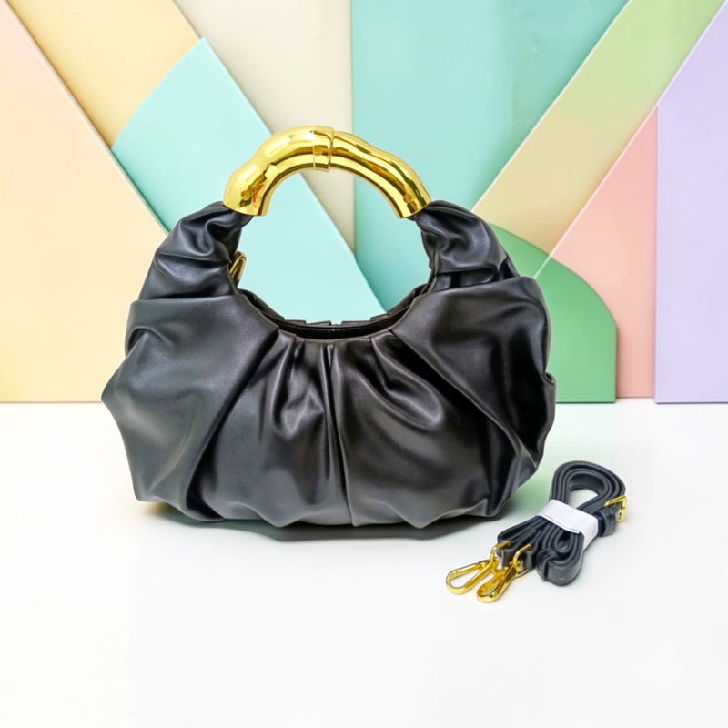 THE GOLD HANDLE CLOUD BAG