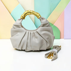 THE GOLD HANDLE CLOUD BAG