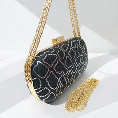 A "PYTHON-EMBOSSED" CLUTCH