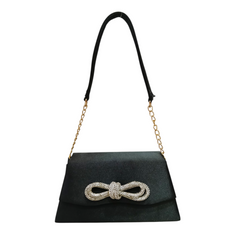 A STATEMENT SATIN POUCHETTE .