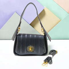 THE PLEATED TURN-LOCK SLING