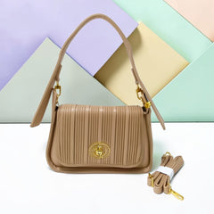 THE PLEATED TURN-LOCK SLING