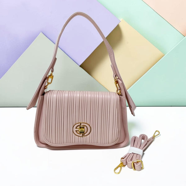 THE PLEATED TURN-LOCK SLING