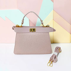 TRAPEZOID TURN-LOCK HANDBAG