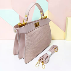 TRAPEZOID TURN-LOCK HANDBAG