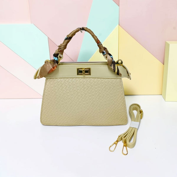TRAPEZOID TURN-LOCK HANDBAG