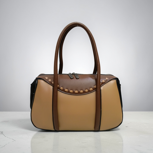 THE CURVE BARREL SATCHEL